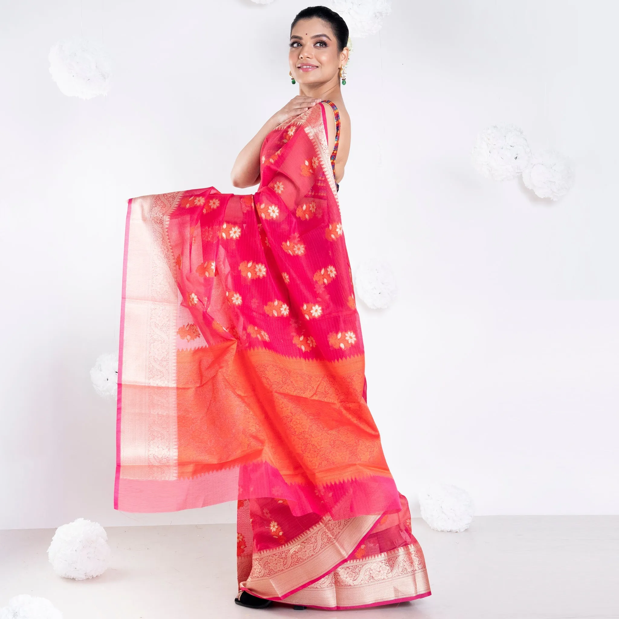 Women Banarasi Kora Cotton Saree In Hot Pink Color With Floral Design And Golden Border