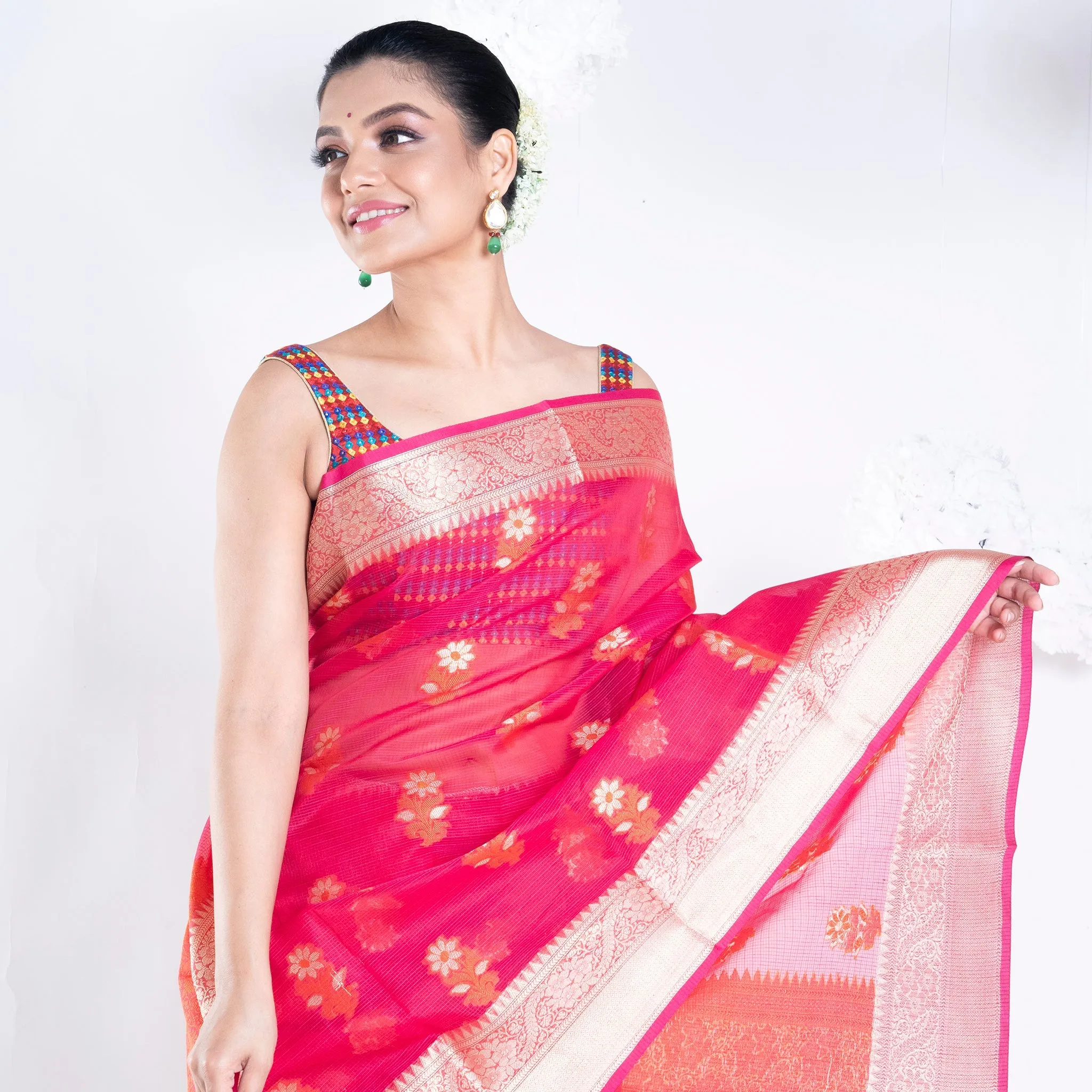 Women Banarasi Kora Cotton Saree In Hot Pink Color With Floral Design And Golden Border