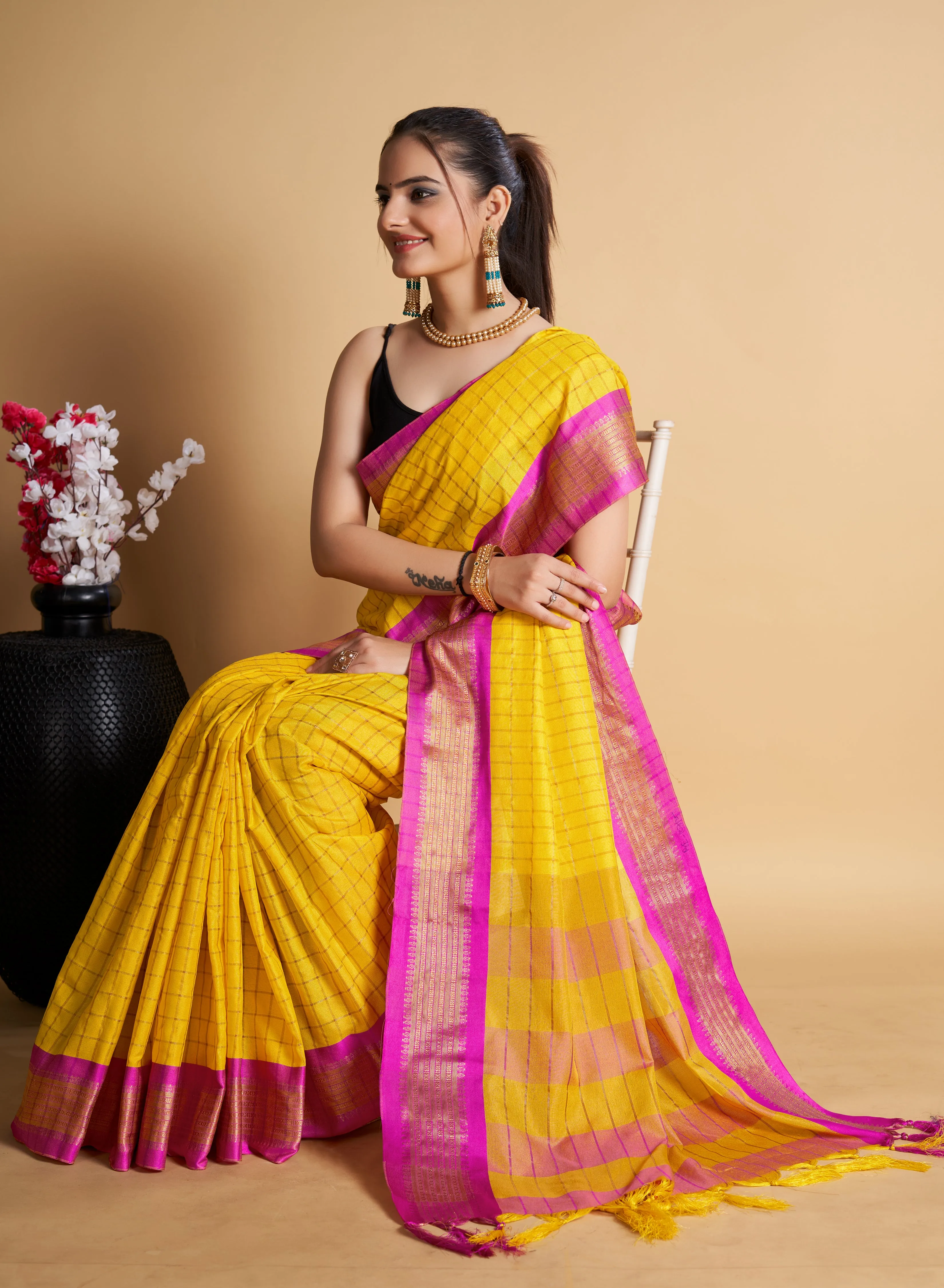Women Party Wear Designer Yellow Color Chex Pattern Silk Blend Saree Collection